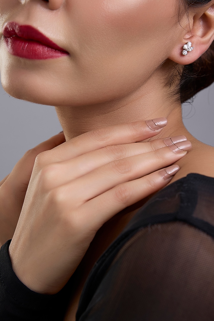 White Finish White Stone Stud Earrings In Sterling Silver by Diosa Paris Jewellery at Pernia's Pop Up Shop