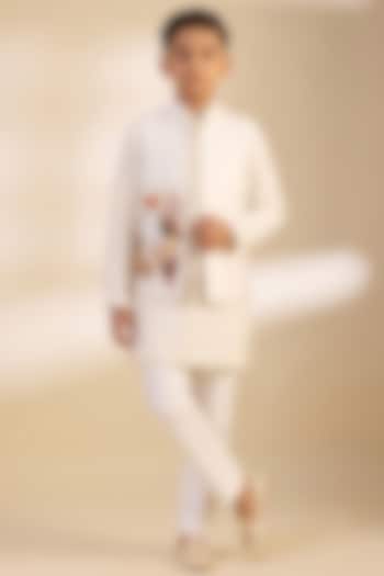 Ivory Raw Silk Floral Embroidered Bundi Jacket Set For Boys by Dapper & Dare Kids at Pernia's Pop Up Shop