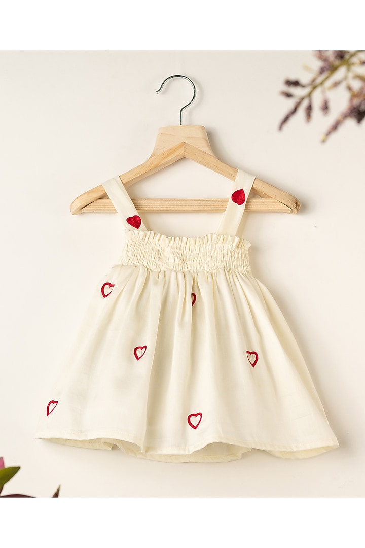 Off-White Cotton Heart Hand Embroidered Dress For Girls by Darleen Kids Couture at Pernia's Pop Up Shop