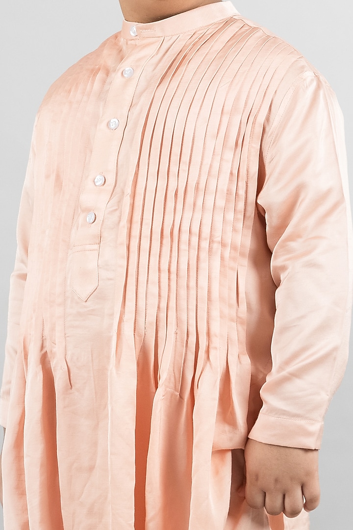 Nude Peach Pintucked Kurta Set For Boys by Darleen Kids Couture at Pernia's Pop Up Shop