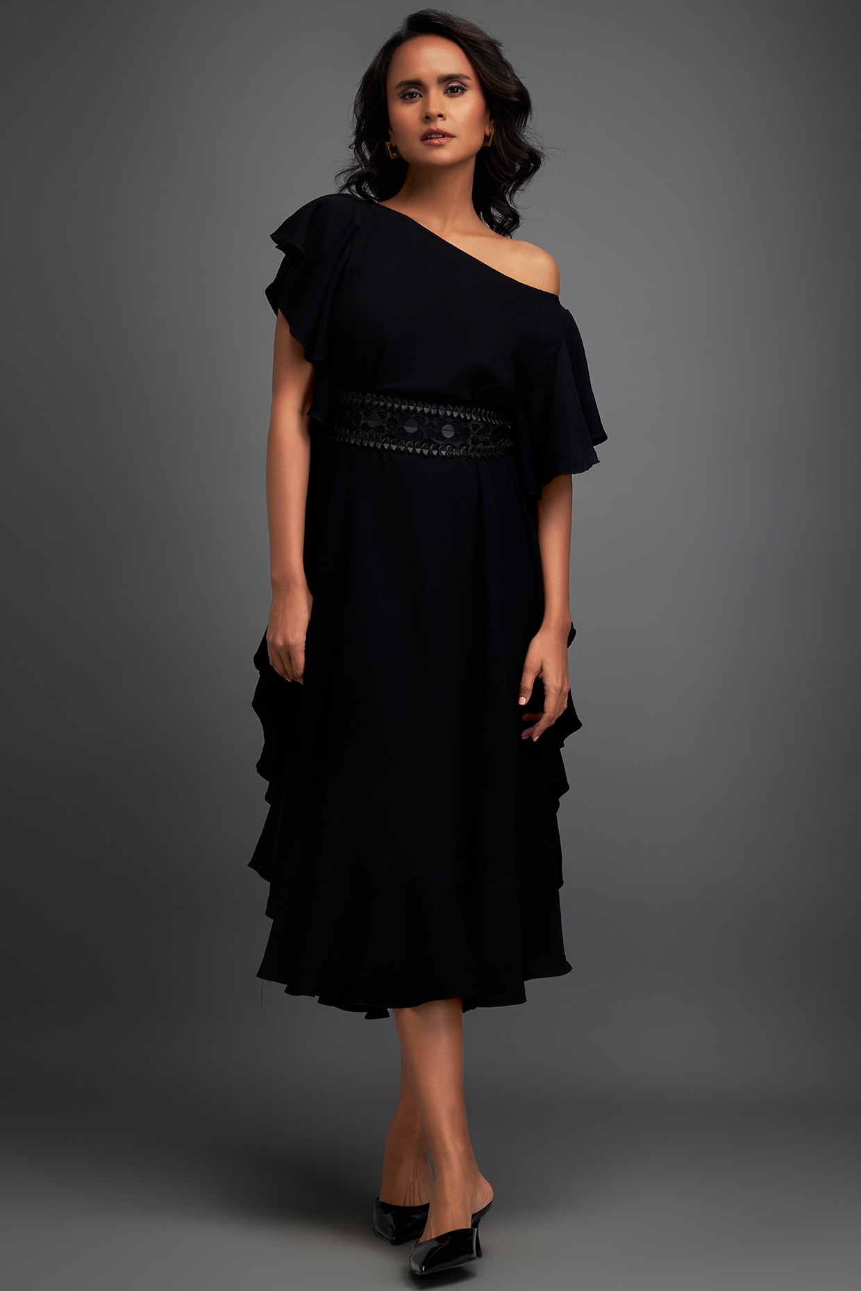 Black Georgette Ruffled Asymmetrical Off-Shoulder Dress by Deepika