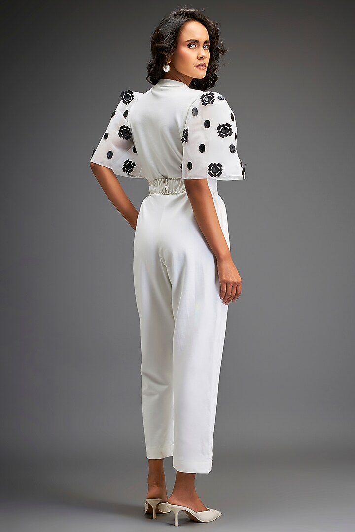 White Ponte Roma Embroidered Jumpsuit With Belt by Deepika Arora at Pernia's Pop Up Shop