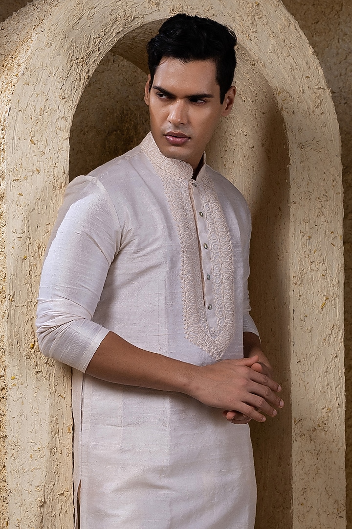 Ivory Raw Silk Hand Embroidered Kurta Set by Darshika at Pernia's Pop Up Shop
