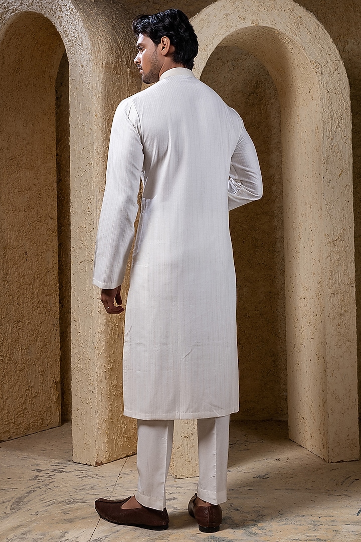 Off-White Cotton Silk Pintucks Kurta Set by Darshika at Pernia's Pop Up Shop