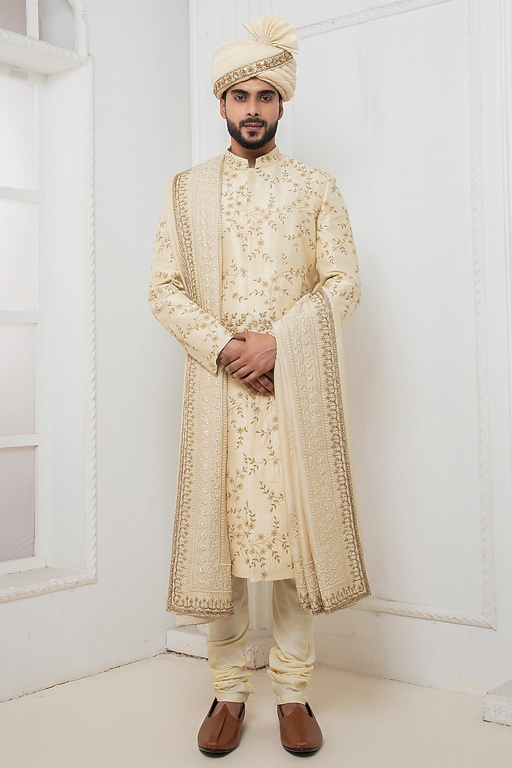 Beige Raw Silk Floral Motif Embroidered Sherwani Set by Darshika