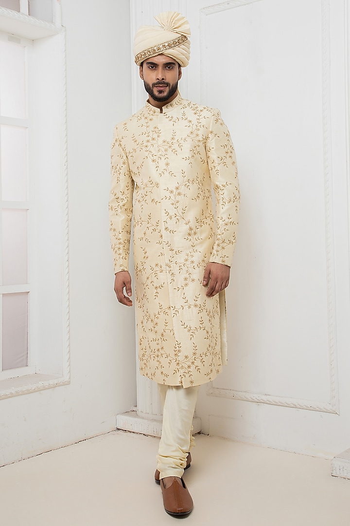 Beige Raw Silk Floral Motif Embroidered Wedding Sherwani Set by Darshika at Pernia's Pop Up Shop