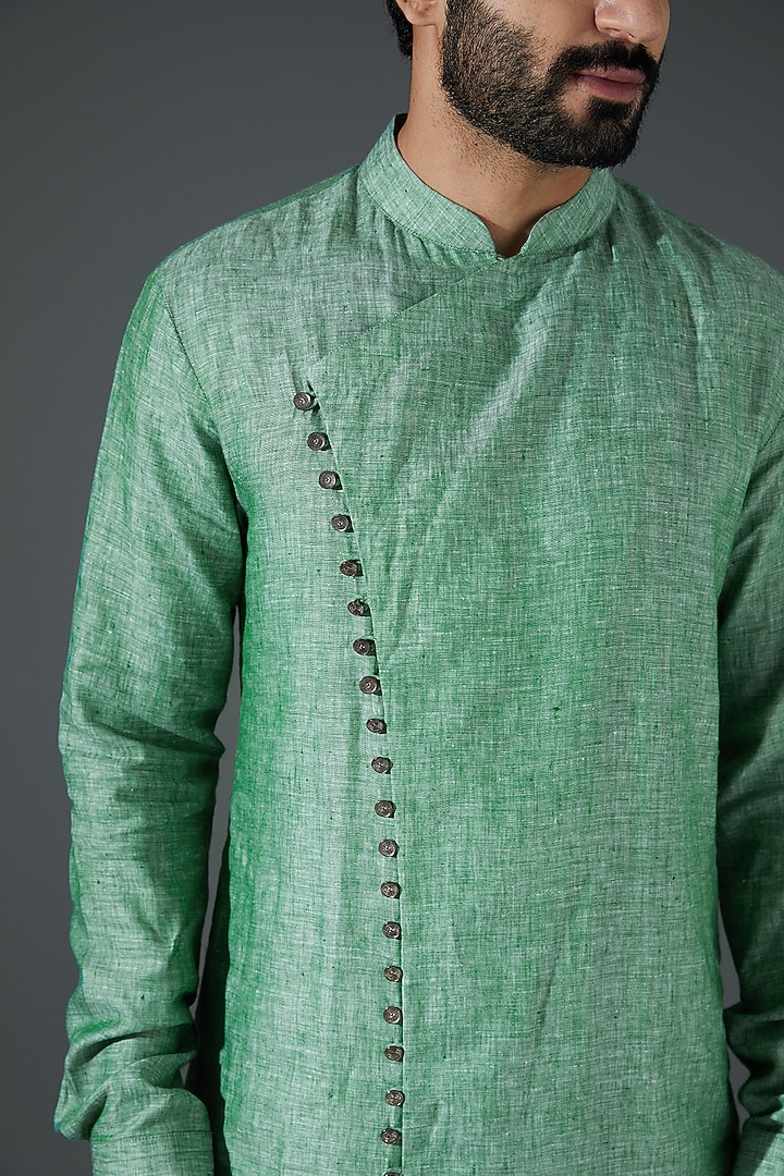 Green Linen Asymmetrical Kurta Set by Darshika at Pernia's Pop Up Shop