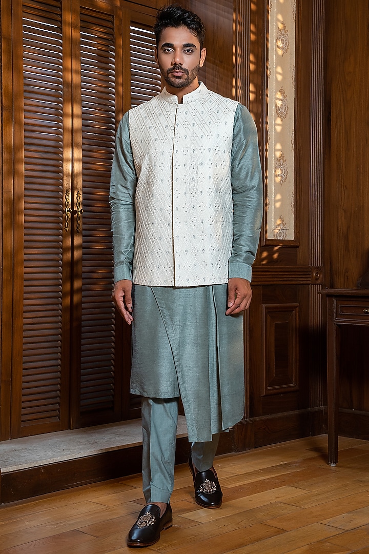 Off-White Silk Blend Hand Embroidered Bundi Jacket Set by Darshika at Pernia's Pop Up Shop