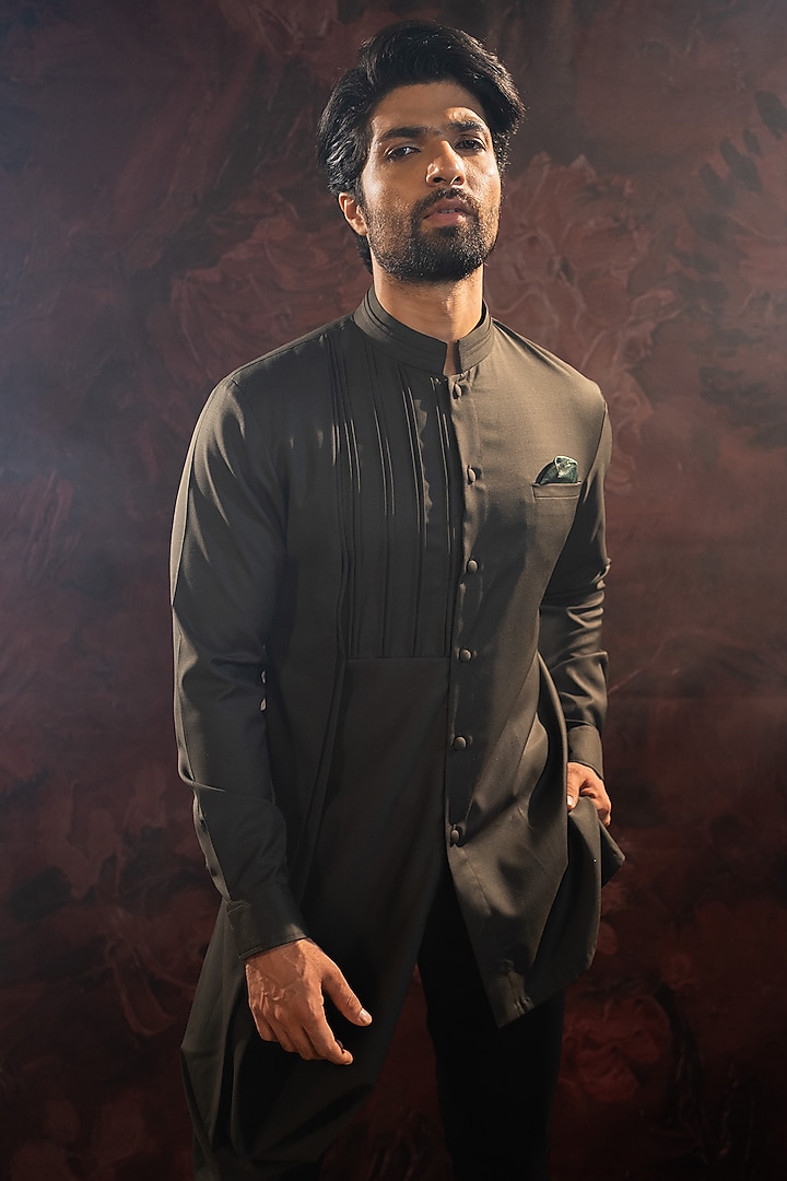 Olive Green Suiting Fabric Asymmetrical Kurta Set by Darshika at Pernia's Pop Up Shop