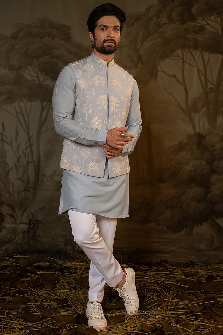 Powder Blue Cotton Silk & Suiting Embroidered Bundi Jacket Set by Darshika