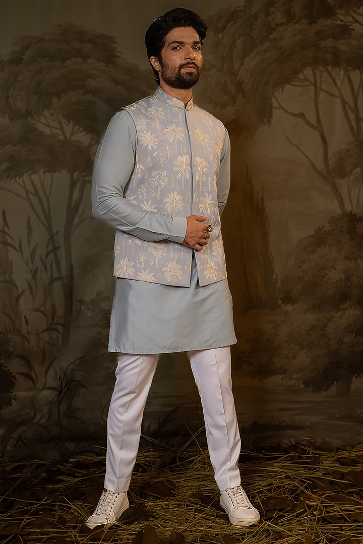 Powder Blue Cotton Silk & Suiting Embroidered Bundi Jacket Set by Darshika at Pernia's Pop Up Shop