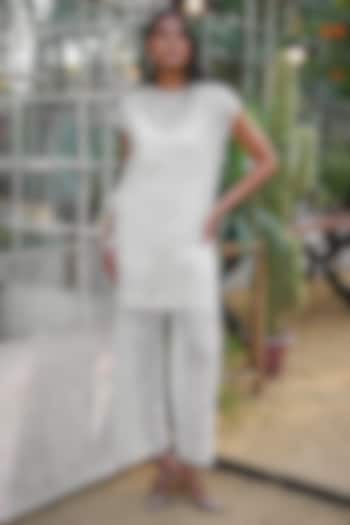 Ivory Recycled Polyester Pants by Dash and Dot at Pernia's Pop Up Shop