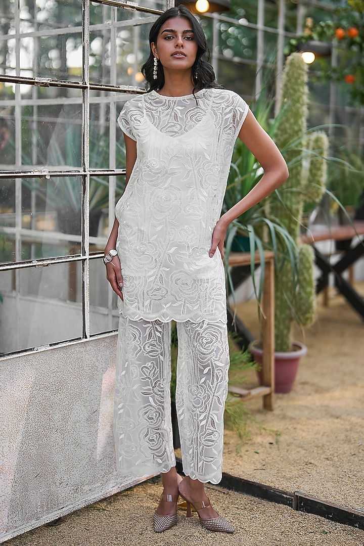 Ivory Recycled Polyester Pants by Dash and Dot at Pernia's Pop Up Shop