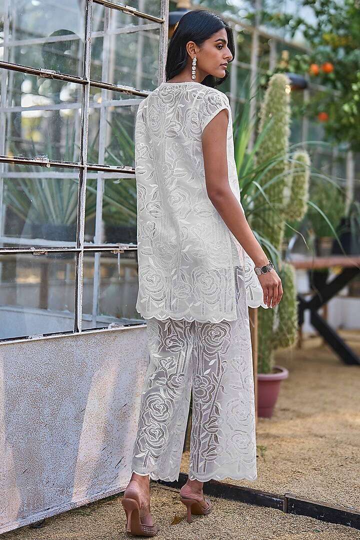 Ivory Recycled Polyester Pants by Dash and Dot at Pernia's Pop Up Shop