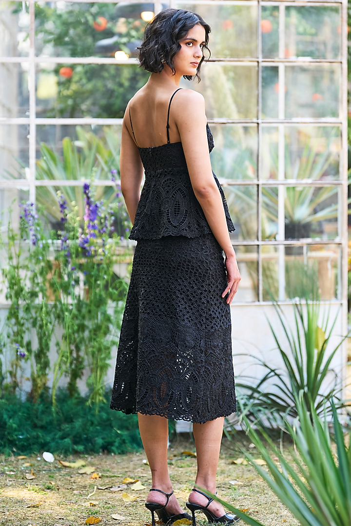 Black Recycled Polyester Strappy Peplum Top by Dash and Dot at Pernia's Pop Up Shop