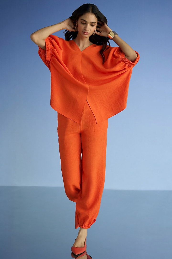 Tangerine Organic Cotton & Recycled Polyester Co-Ord Set by Dash and Dot at Pernia's Pop Up Shop