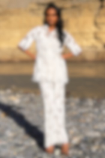 White Organic Cotton Floral Lace Cutwork Wide-Leg Pants by Dash and Dot at Pernia's Pop Up Shop