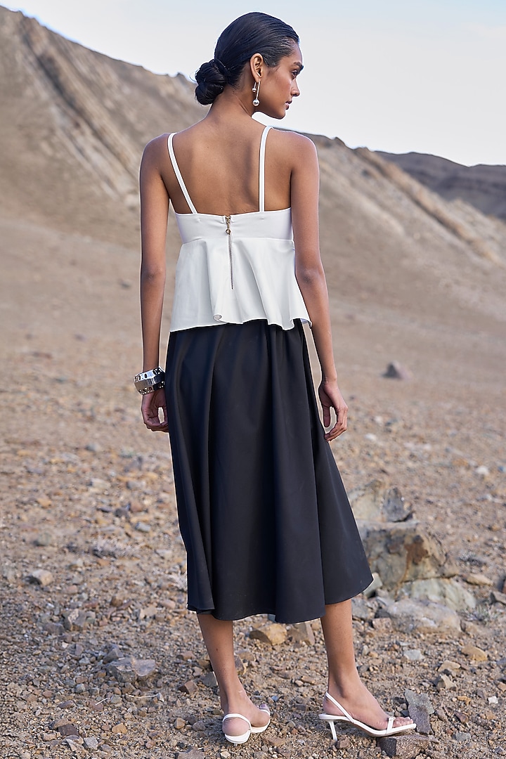 White Spandex & Viscose Peplum Spaghetti Top by Dash and Dot at Pernia's Pop Up Shop