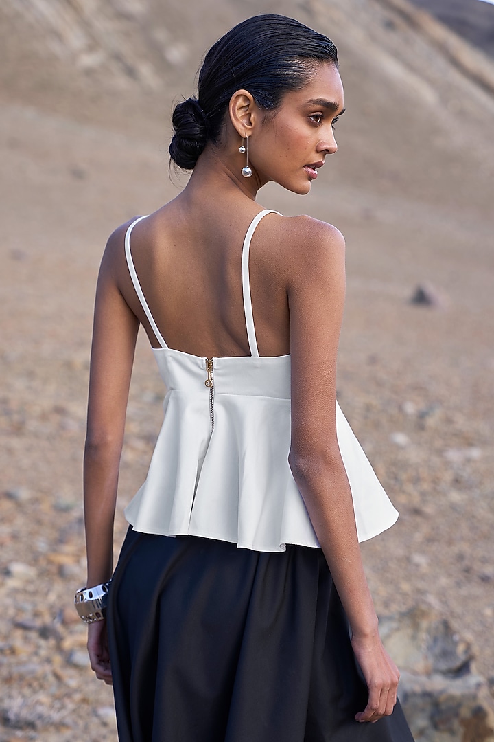 White Spandex & Viscose Peplum Spaghetti Top by Dash and Dot at Pernia's Pop Up Shop