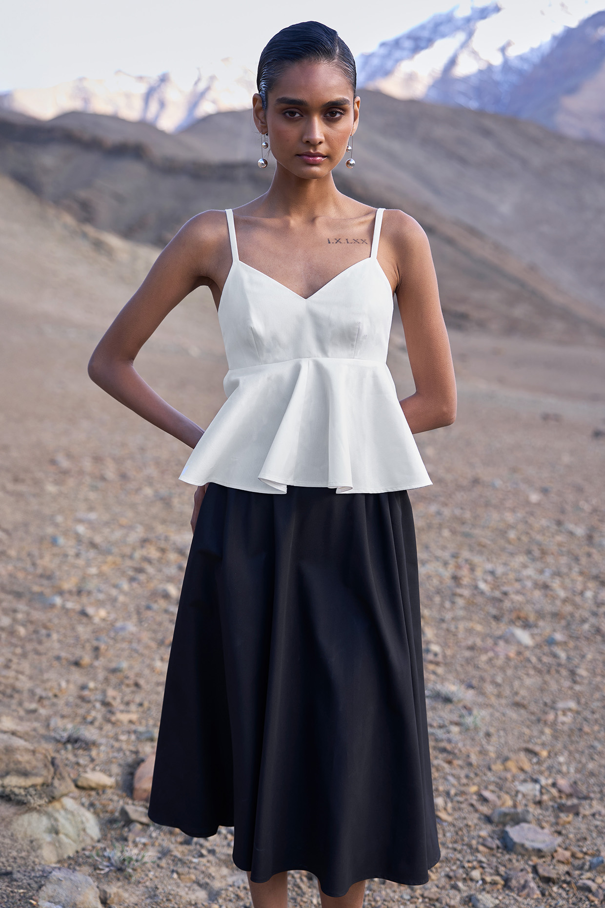 Black Viscose & Spandex A-Line Midi Skirt by Dash and Dot at Pernia's Pop Up Shop