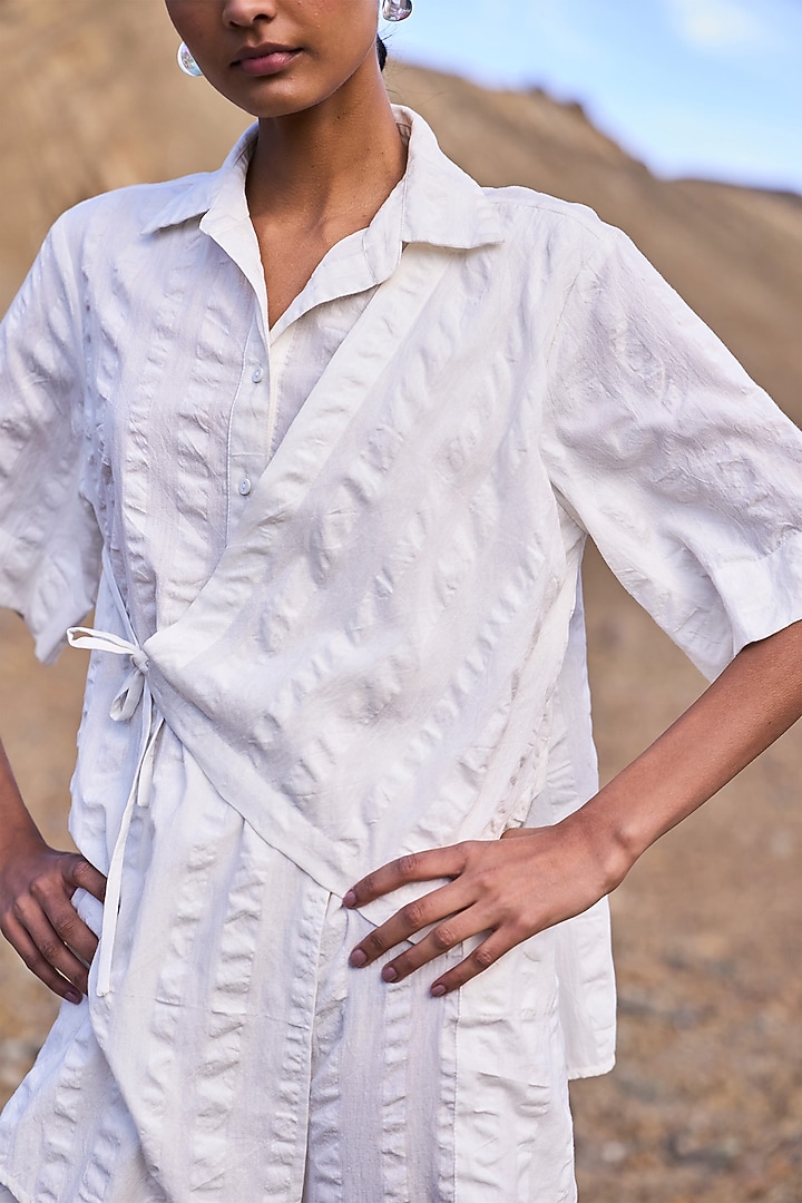White Organic Cotton Asymmetrical Wrap Shirt by Dash and Dot at Pernia's Pop Up Shop