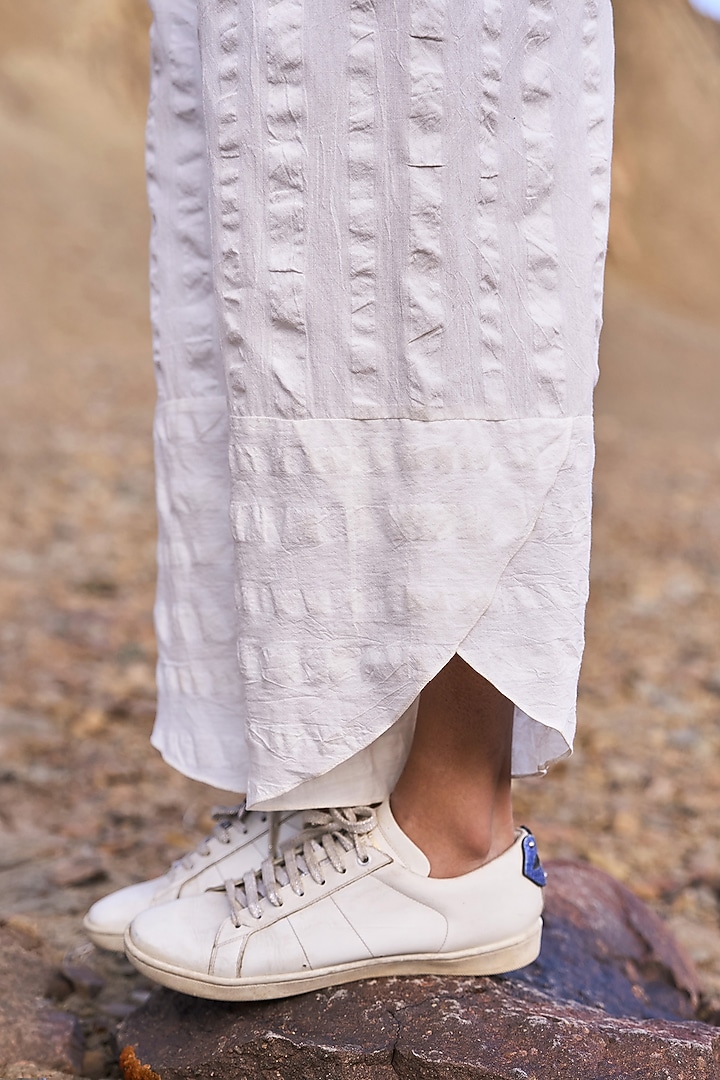 White Organic Cotton Asymmetrical Tulip Pants by Dash and Dot at Pernia's Pop Up Shop
