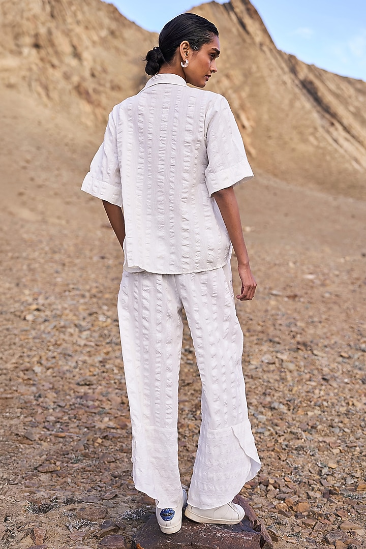 White Organic Cotton Asymmetrical Co-Ord Set by Dash and Dot at Pernia's Pop Up Shop