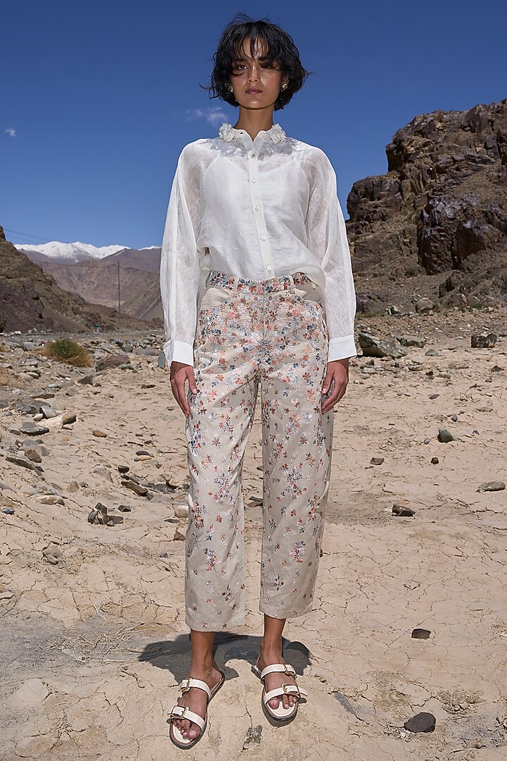 Beige Linen Floral Embroidered Straight-Fit Pants by Dash and Dot at Pernia's Pop Up Shop