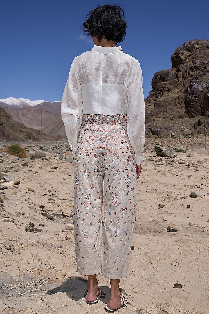 Beige Linen Floral Embroidered Straight-Fit Pants by Dash and Dot at Pernia's Pop Up Shop