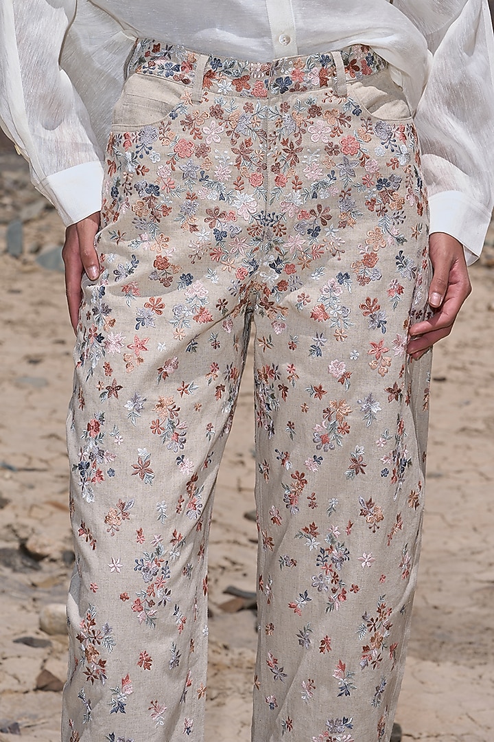 Beige Linen Floral Embroidered Straight-Fit Pants by Dash and Dot at Pernia's Pop Up Shop