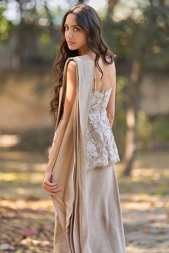 Taupe Recycled Polyester Embroidered Peplum Top by Dash and Dot at Pernia's Pop Up Shop