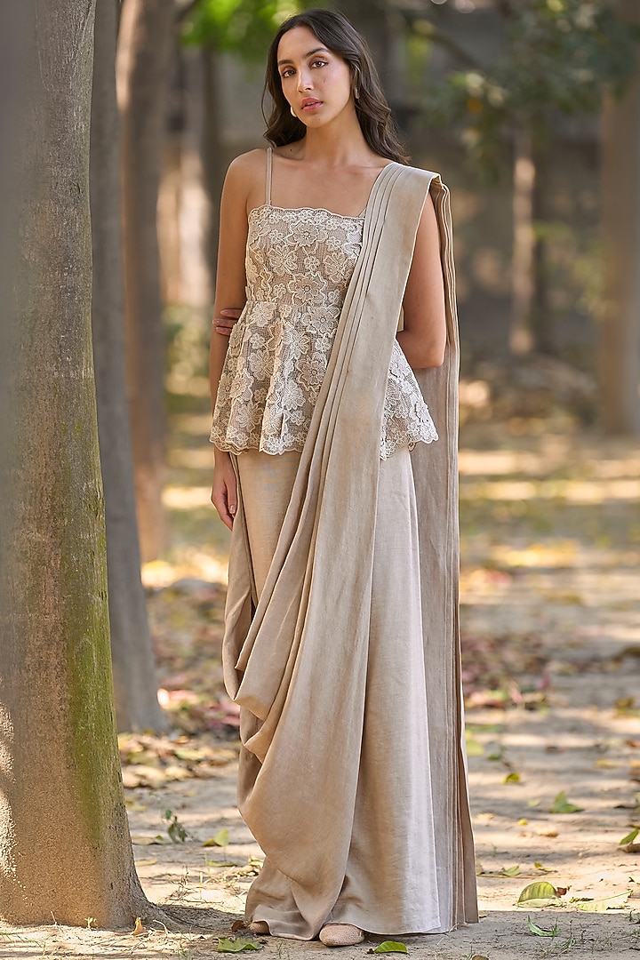Taupe Recycled Polyester Embroidered Peplum Top by Dash and Dot at Pernia's Pop Up Shop