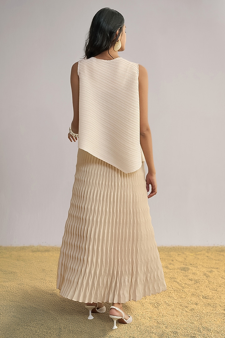 Blush Pink Recycled Polyester Pleated Skirt by Dash and Dot at Pernia's Pop Up Shop