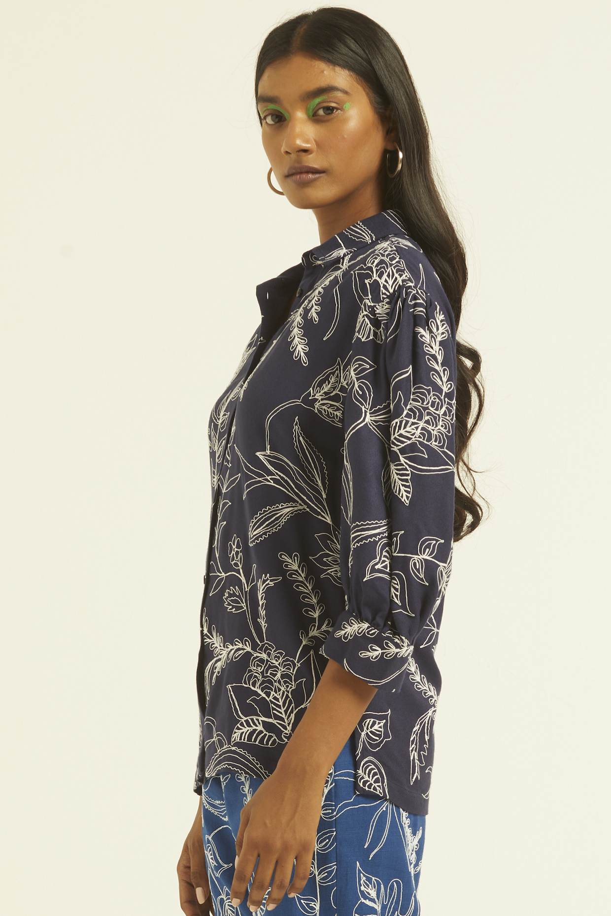 Blue Embellished Tapered Fit Pants by Dash and Dot at Pernia's Pop Up Shop