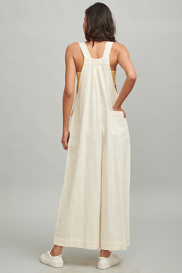 Ivory Cotton Flowy Dungarees by Dash and Dot at Pernia's Pop Up Shop