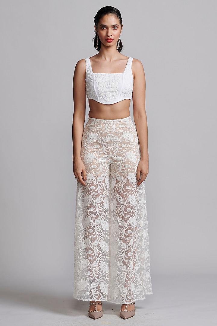 Ivory Recycled Polyester Floral Thread Embroidered Pants by Dash and Dot at Pernia's Pop Up Shop