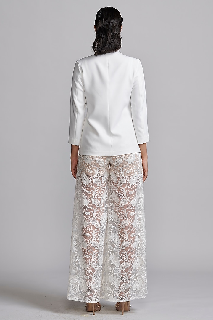 Ivory Recycled Polyester Floral Thread Embroidered Pants by Dash and Dot at Pernia's Pop Up Shop