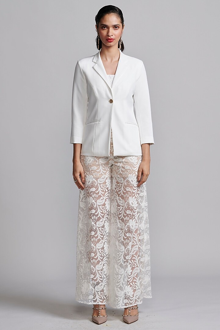 Ivory Recycled Polyester Floral Thread Embroidered Pants by Dash and Dot at Pernia's Pop Up Shop