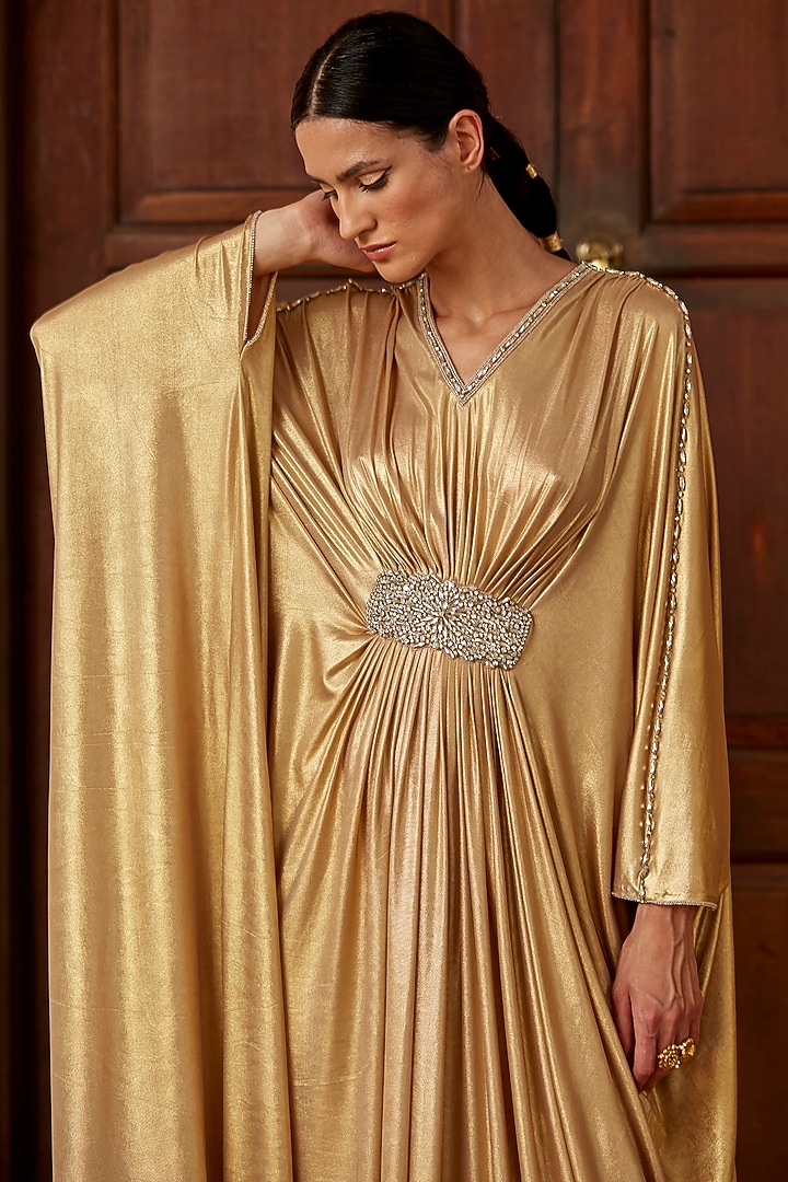 Gold Embellished Kaftan With Belt by DANIA SIDDIQUI at Pernia's Pop Up Shop