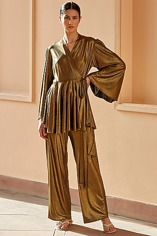 Antique Gold Metallic Lycra Pants by DANIA SIDDIQUI