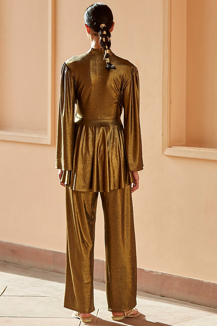Antique Gold Metallic Lycra Pants by DANIA SIDDIQUI at Pernia's Pop Up Shop