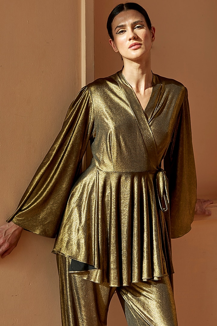 Antique Gold Metallic Lycra Pants by DANIA SIDDIQUI at Pernia's Pop Up Shop