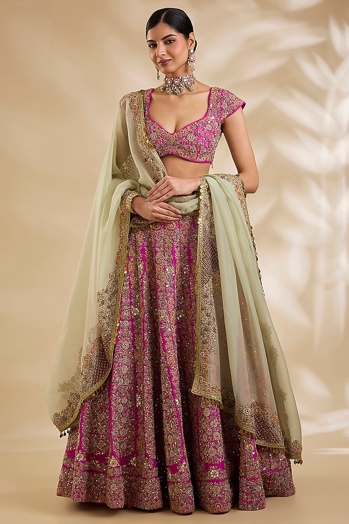Rani Pink Raw Silk Hand & Machine Embroidered Bridal Lehenga Set by Debyani at Pernia's Pop Up Shop