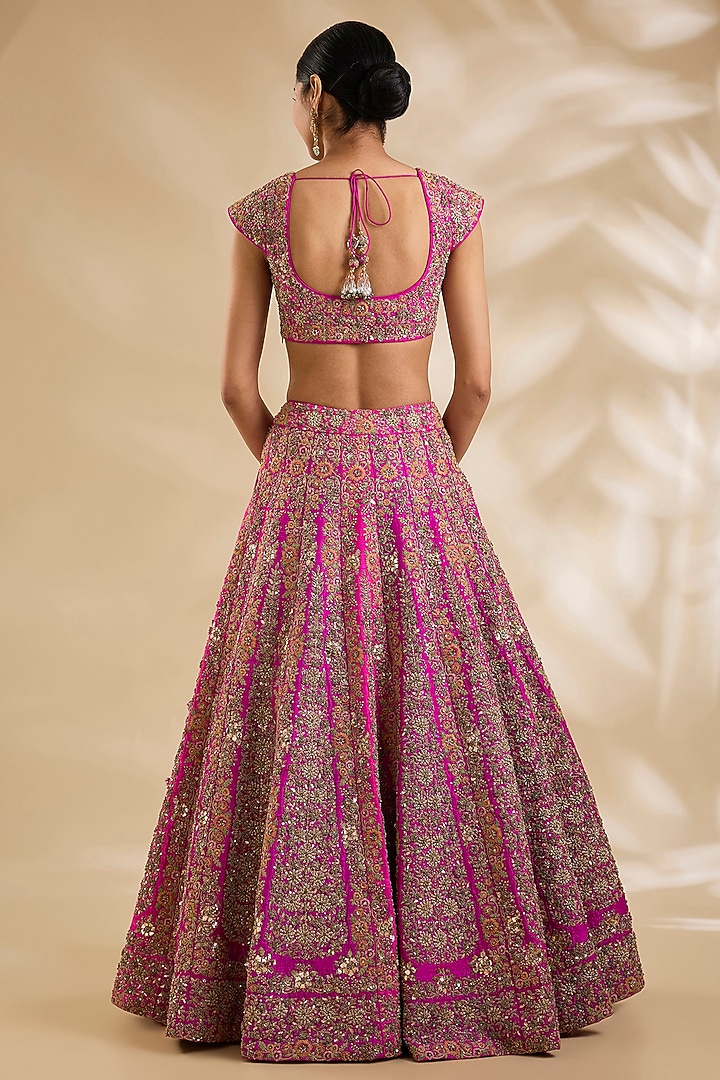 Rani Pink Raw Silk Hand & Machine Embroidered Bridal Lehenga Set by Debyani at Pernia's Pop Up Shop
