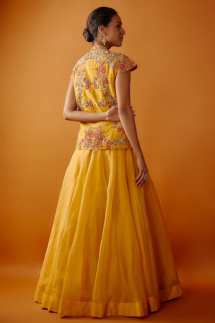 Mustard Raw Silk Jacket Lehenga Set by Debyani at Pernia's Pop Up Shop