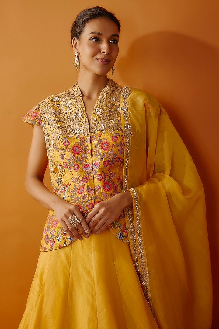 Mustard Raw Silk Jacket Lehenga Set by Debyani at Pernia's Pop Up Shop