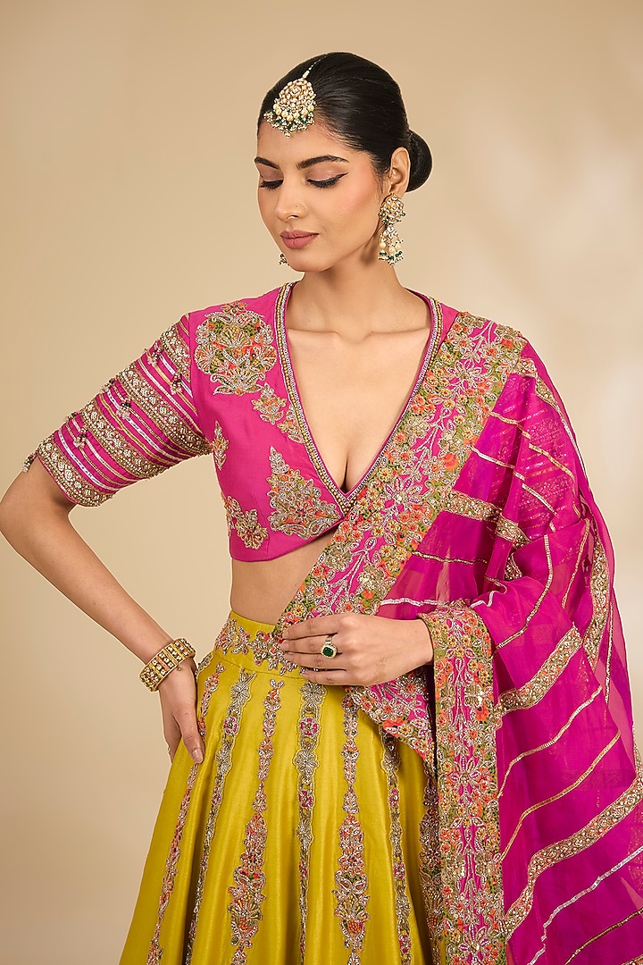 Yellow Organza Hand & Machine Embroidered Bridal Lehenga Set by Debyani at Pernia's Pop Up Shop