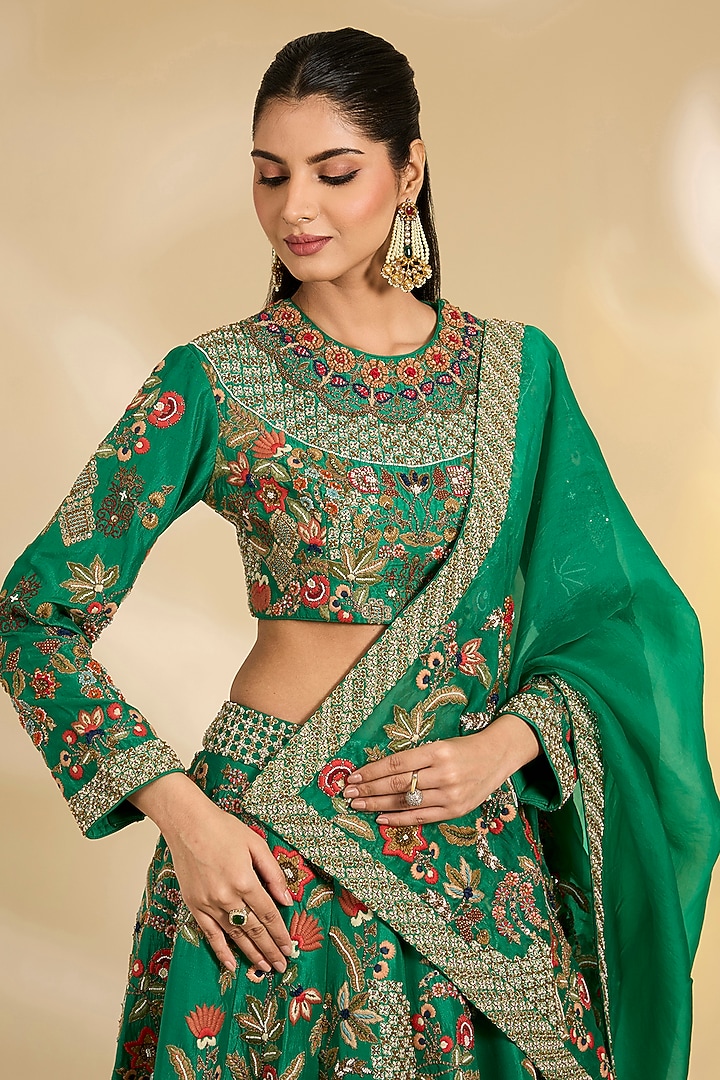 Green Silk Hand & Machine Embroidered Bridal Lehenga Set by Debyani at Pernia's Pop Up Shop