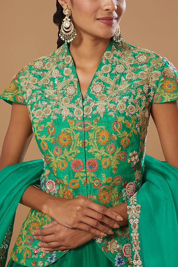 Green Raw Silk Jacket Wedding Lehenga Set by Debyani at Pernia's Pop Up Shop