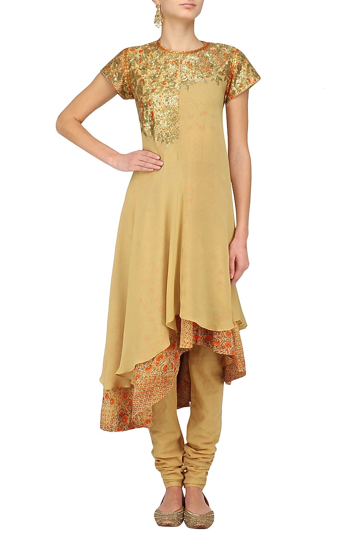 Beige high low orange print tier kurta and churidaar set available only at Pernia's Pop Up Shop.